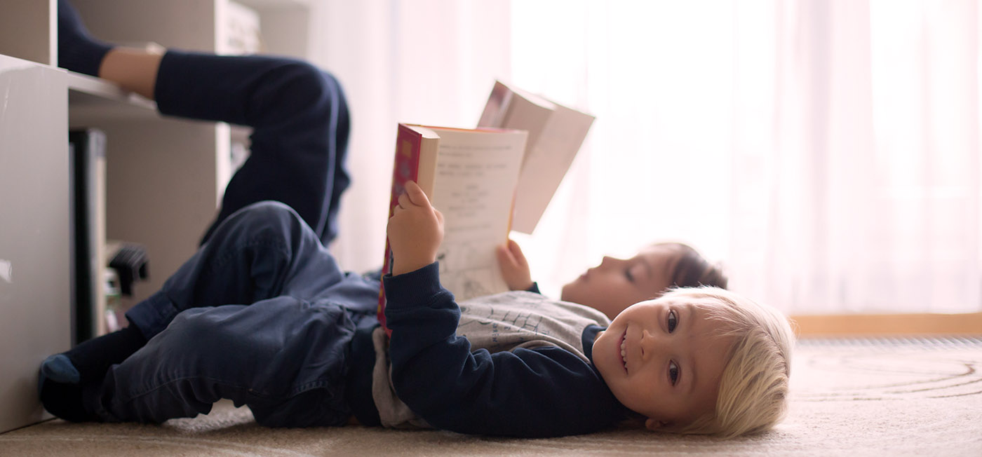 Education and hearing - two little boys reading